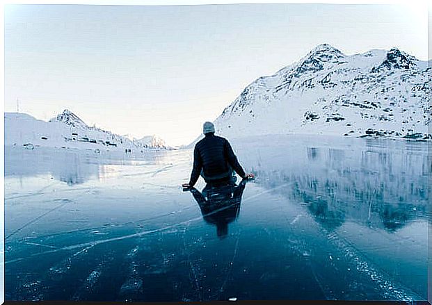 man facing an icy landscape