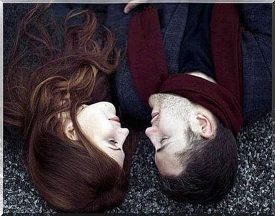 couple-lying-on-the-ground